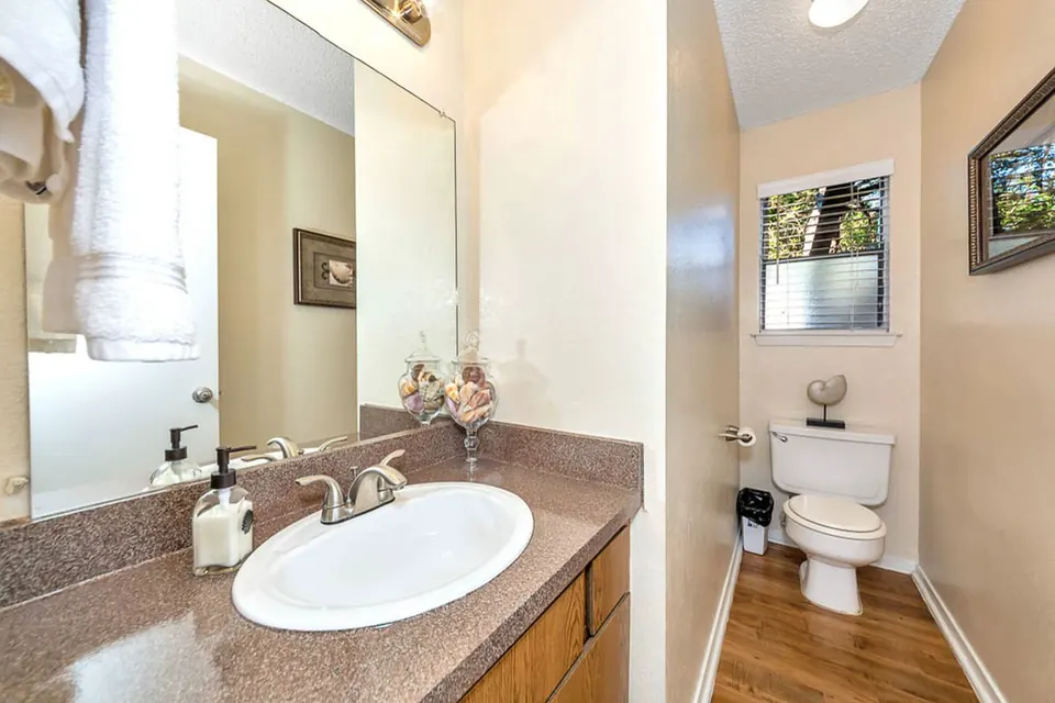 Bathroom vanity with a large mirror