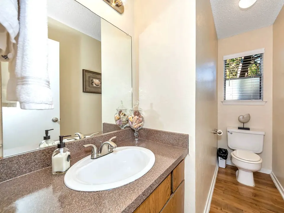 Bathroom vanity with a large mirror